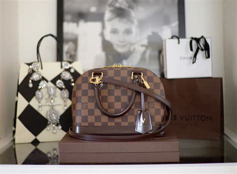 louis vuitton alma damier azur|REVIEW .